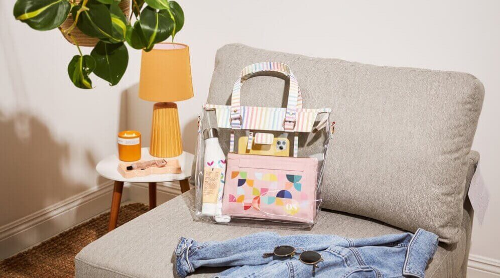 How to Organize Tote Bags, 10 Practical Tips - Clear tote bag with color-coded items